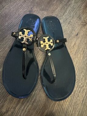 Tory Burch Black Jelly Thong Sandals with Gold Logo Accent